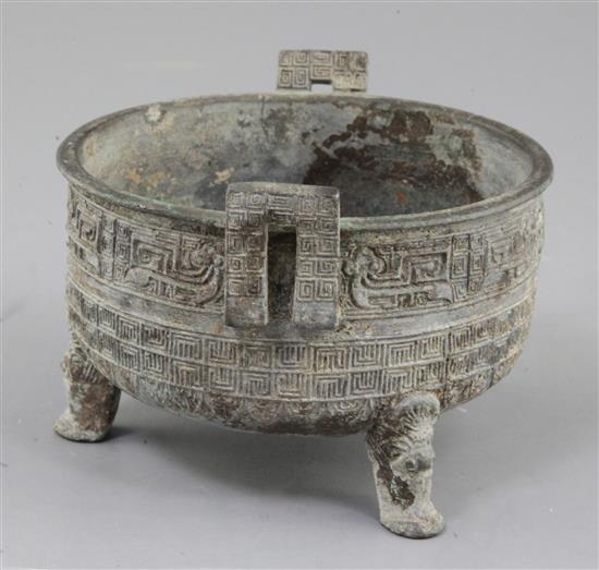A Chinese archaic bronze tripod food vessel, Ding, probably Warring States period, 5th-2nd century B.C., 14.5cm, 9.5cm high, repair